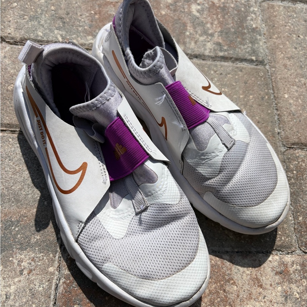 Nike White Slip-On Sneakers with Purple Strap and Copper Swoosh